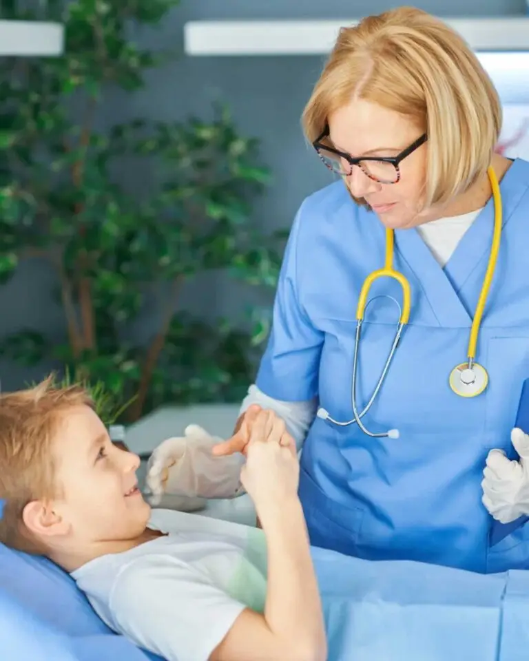 a doctor bedside with a young patient